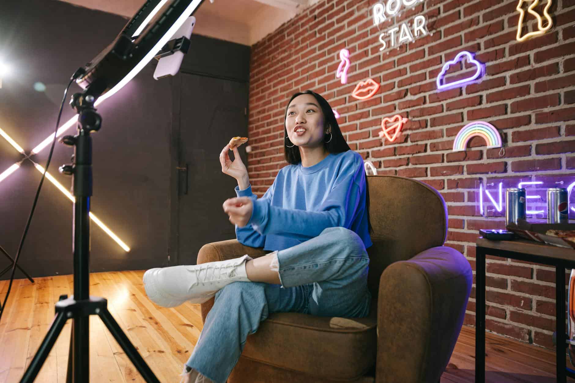 a woman recording herself as an influencer and travel law